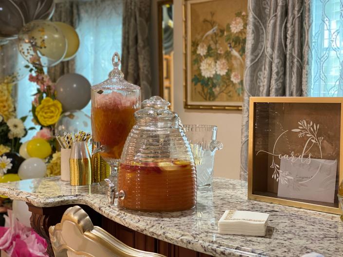 We used our beehive glass beverage dispenser at the drink station for the Mommy to Bee baby shower