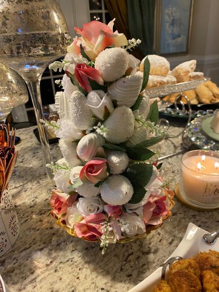 This sweet little chocolate covered strawberry tower was created using white chocolate, edible glitter and sugar crystals, as well as using silk pink and white flowers for a retirement party 