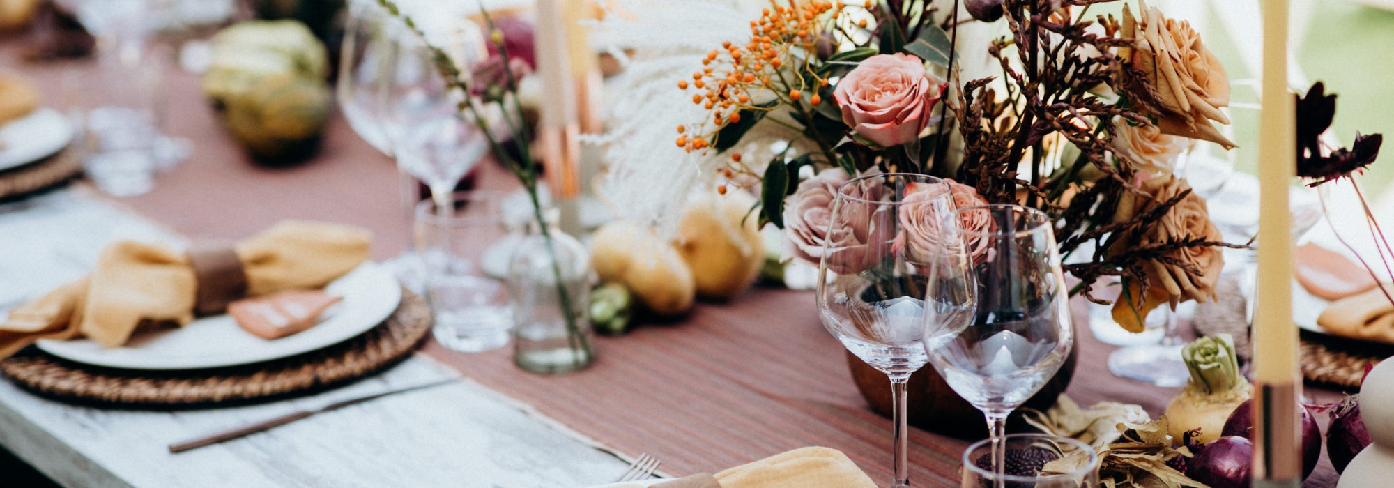 beautiful wedding reception table with fall-themed colors