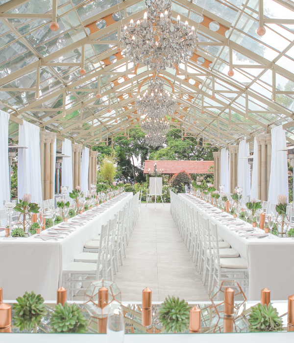 beautiful wedding reception held in a greenhouse