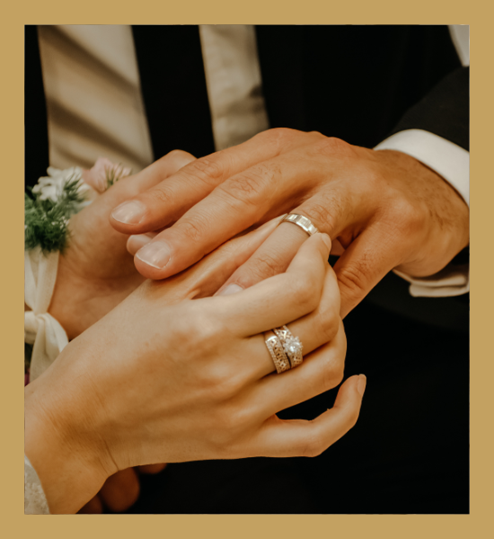 bride holding fall-colored bouquet