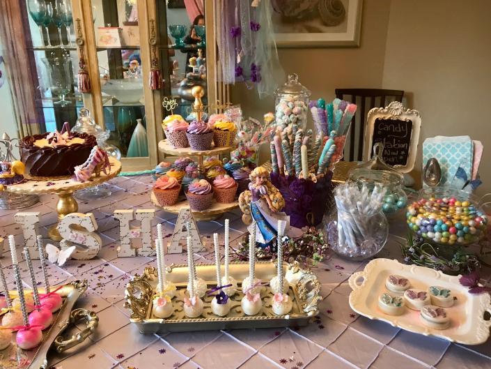 Cake pops, cupcakes, chocolate covered Oreo's, chocolate covered pretzel rods and mini chocolate cake. 